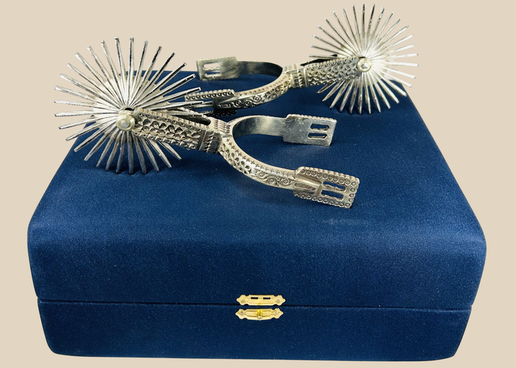 Chilean huaso spurs in nickel silver with large star rowels and presentation case