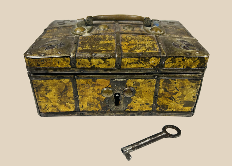 Early 19th century Eastern European iron-bound jewelry casket with gilt frost patterned metal panels and original key.