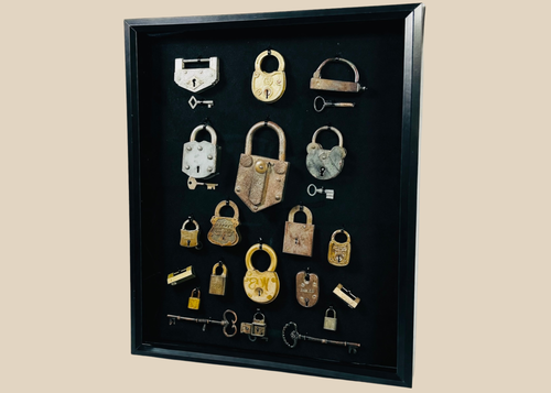 Vintage locks and keys display featuring 19th and early 20th century padlocks