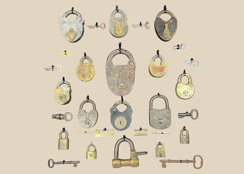 Vintage locks and keys display featuring 18 locks and 12 keys in frame