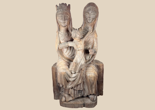 Hand-carved European wooden sculpture depicting the Virgin Mary, Saint Anne, and the Christ Child in Gothic Revival style
