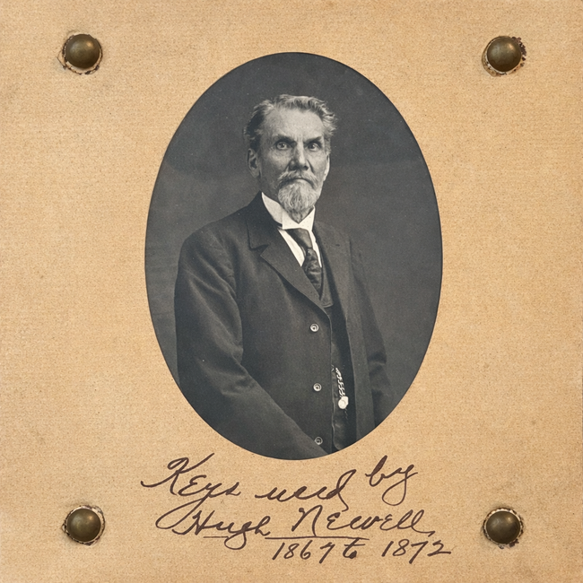 Victorian-era key collection with watchman Hugh Newell portrait