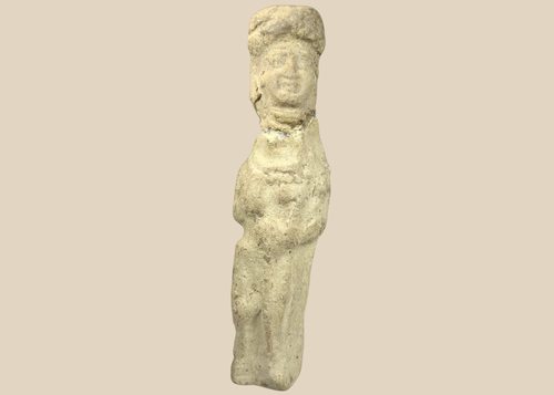 Ancient Mesopotamian terracotta female figurine with folded arms