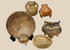 Pre-Columbian ceramic artifact collection featuring six vessels including effigy forms and painted pottery
