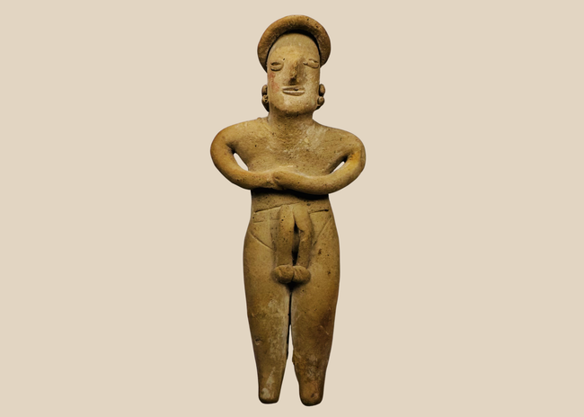 Pre-Columbian Colima terracotta female figure with folded arms and circular headdress, West Mexico, circa 300 BCE–300 CE.