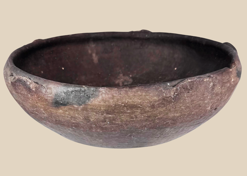 Ancient Pre-Columbian terracotta bowl with raised rim lugs and dark burnished surface