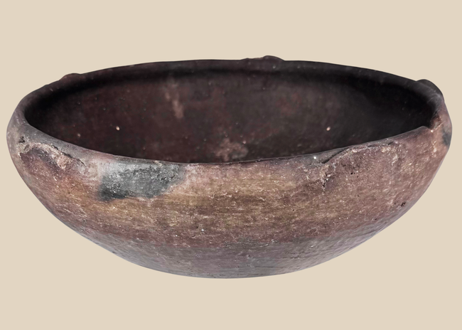 Ancient Pre-Columbian terracotta bowl with raised rim lugs and dark burnished surface