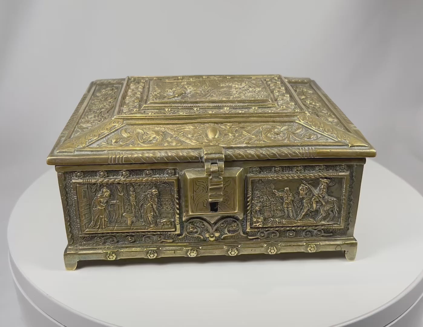Video showcasing Belgian Renaissance Revival gilt bronze cigar box with detailed relief panels interior plaque and hinged lid functionality