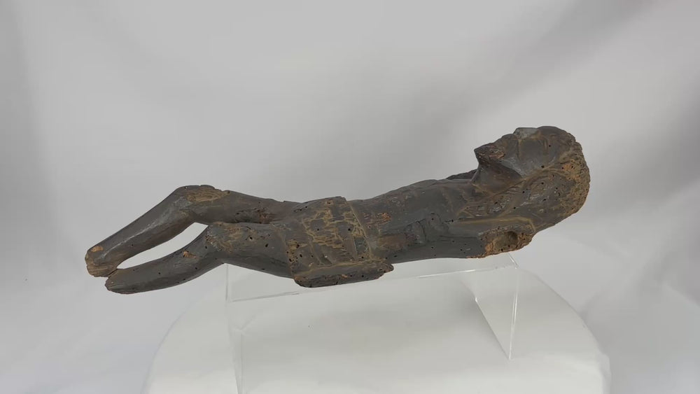 360-degree view of a 16th century Spanish Colonial carved wooden Christ figure, showing expressive carved features, heavy devotional wear, and traces of original polychrome surface.