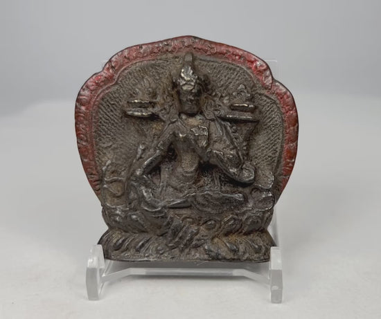 360-degree view of Tibetan bronze Buddhist devotional plaque with seated deity relief