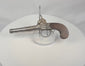 Video of a British percussion pocket pistol with cannon-form barrel, London marking, and wooden grip, circa 1830–1850