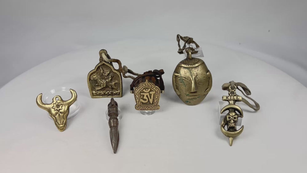 Video showcasing a set of six Tibetan bronze protective amulets with sacred imagery, 19th–early 20th century
