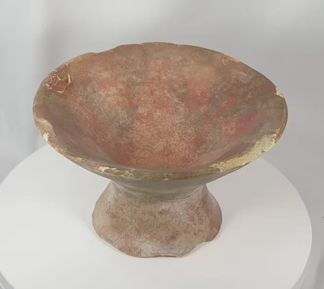 360-degree rotating view of a Pre-Columbian terracotta pedestal bowl featuring a flared basin, hollow footed base, and hand-painted geometric decoration in red, cream, and dark brown pigments. An ancient ceremonial vessel displaying extensive age, restoration, and archaeological character.