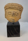 360-degree view of Pre-Columbian West Mexican terracotta head fragment on museum stand