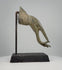 360-degree rotating view of an antique 19th-century Thai gilt bronze Buddha hand sculpture, attributed to the Rattanakosin period. Features an elegant Vitarka Mudra teaching gesture, elongated fingers, raised floral lotus motif on the palm, and an ornate wrist cuff with intricate relief decoration. The golden bronze surface displays natural green and brown patination, with the artifact mounted on a black display stand.