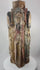 360-degree view of a Spanish Colonial carved wooden devotional column featuring four haloed saint figures with traces of original painted decoration and aged patina.