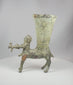 360 degree rotating view of antique bronze rhyton vessel with centaur figure holding goat showing detailed patina and sculptural form from all angles