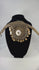 Antique Papua New Guinea ceremonial adornment with cowrie shell and animal teeth fringe