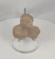360-degree video of an ancient Classical Mediterranean terracotta figural bust fragment showcasing its mold-made construction, stylized facial features, archaeological patina, and Hellenistic to Roman craftsmanship.