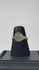 Video showing an Early Byzantine bronze finger ring with radiate geometric bezel, incised hoop decoration, complete band, and archaeological patina from multiple angles.