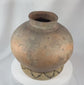 360-degree view of an antique Timorese earthenware storage vessel featuring hand-painted spiral motifs, a globular form, rich aged patina, and traditional Southeast Asian craftsmanship.