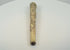 Video showcasing a Japanese Meiji-period carved bone handle or sword fitting with samurai imagery, landscape details, darkened engraving and an open attachment socket, circa 1870–1910