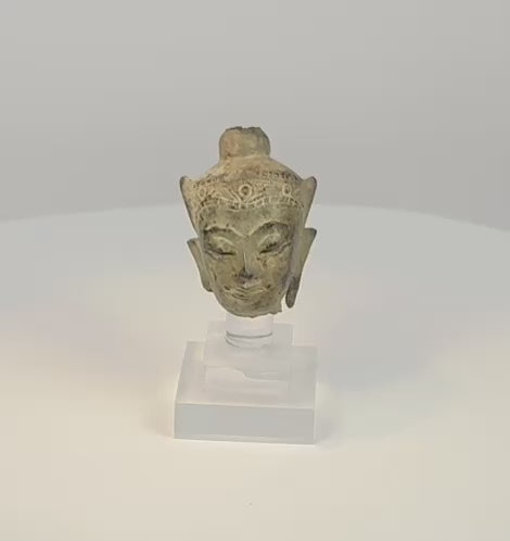 15th–18th century Southeast Asian crowned bronze Buddha head with serene expression, engraved