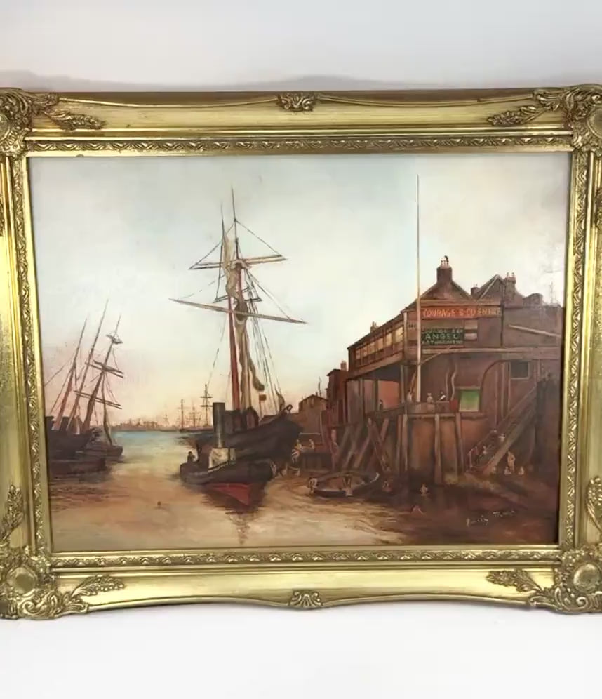 Video of an original 1990 oil painting signed Emily Muse, depicting The Famous Angel public house in Rotherhithe, London, with historic sailing ships, detailed maritime rigging, Thames waterfront buildings, and figures along the wharf. The video showcases the painting's intricate details and ornate gold-toned decorative frame.