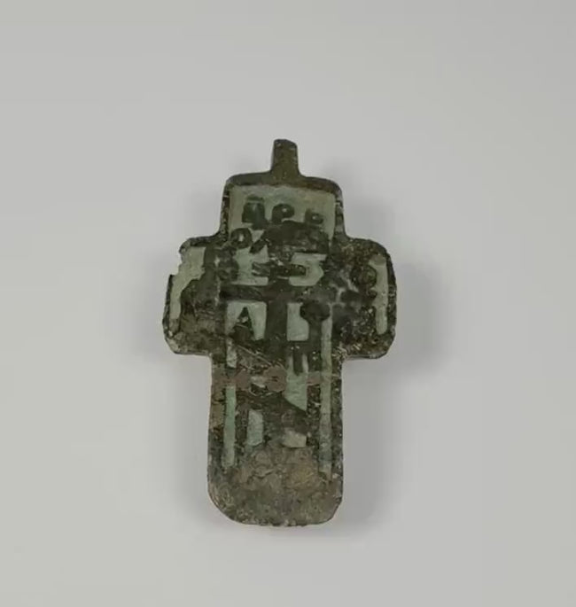 Orthodox champlevé enamel cross pendant with Cyrillic inscriptions and green enamel, circa 1780–1820, shown in rotating 360-degree video.