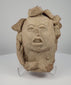 Video showcasing an ancient Pre-Columbian Mesoamerican terracotta head dating to circa 1000–1500 CE, highlighting its elaborate headdress, half-closed eyes, slightly open mouth, hand-formed clay construction, and naturally aged earthen patina.
