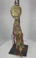 360-degree view of Tibetan gilt bronze guardian mask pendant with textile tassels and bead elements
