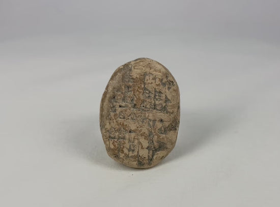 Old Babylonian baked clay cuneiform tablet, 1900–1600 BCE Mesopotamia, bi-faced lenticular school tablet with student practice inscriptions, earthen patina and mineral accretions