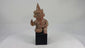 Video showing a West Mexican Nayarit seated terracotta figure with tall conical headdress and archaeological patina, ca. 100 BCE–300 CE