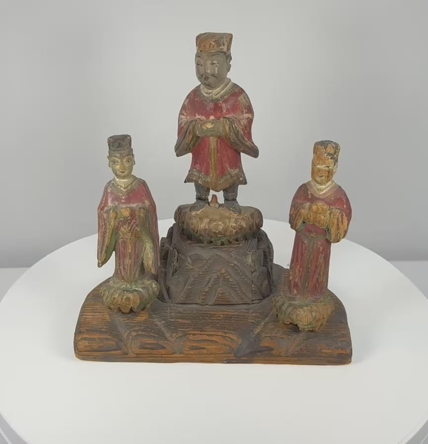 Video showing multiple views and painted details of a Late Qing Dynasty Chinese wooden shrine group with a central official and two attendants