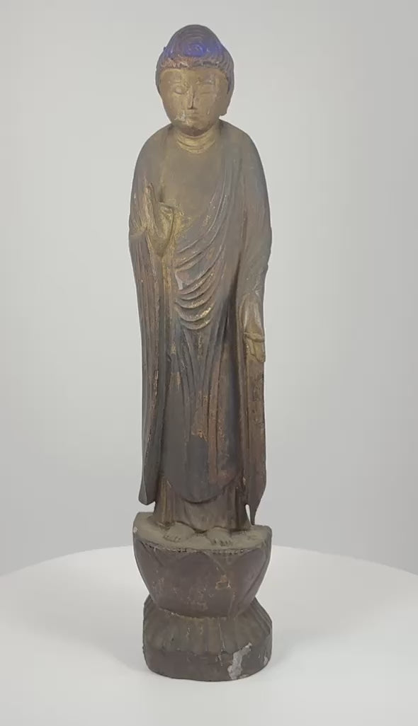 360-degree video of an antique Japanese carved wood Amida Nyorai Buddha showing the raigō-in gesture, gilding, blue-painted hair, lotus pedestal, inscription, and aged surface