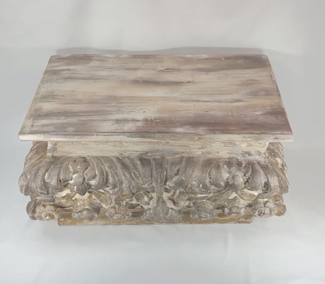 360-degree video of an antique Baroque / Rococo carved wood architectural fragment stand showing ornate acanthus carving, traces of gilding, aged surface wear, and sculptural presence