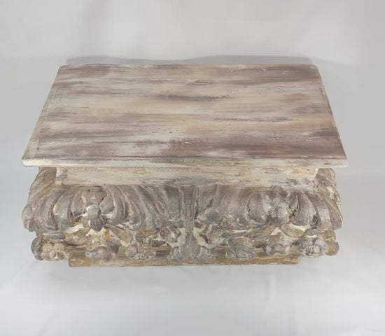 360-degree video of an antique Baroque / Rococo carved wood architectural fragment stand showing ornate acanthus carving, traces of gilding, aged surface wear, and sculptural presence