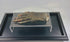 Close-up video of an authentic ancient Egyptian mummified hand (700–200 BCE), displayed on a clear acrylic stand, showcasing preserved skin and bone detail — verified artifact offered by Relic and Rarity.
