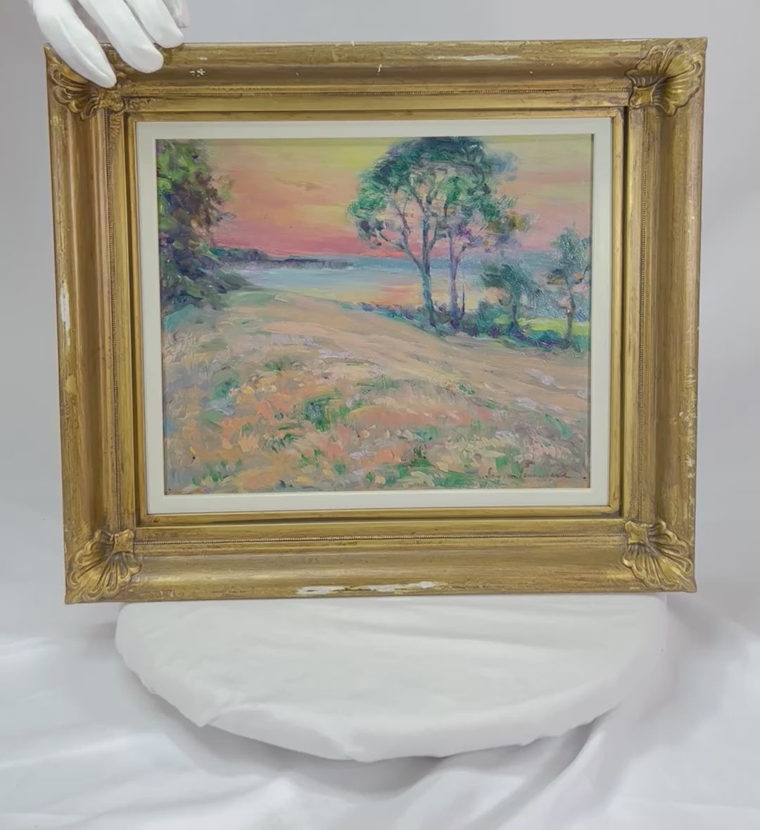 Original oil on panel painting depicting the rugged coastline of Black Rock, Bay of Fundy, Nova Scotia, with impressionistic brushwork, vibrant skies, and coastal landscape; framed in a gold wooden frame, signed in lower right by artist “Guy.”