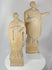 360-degree rotating view of a pair of antique hand-carved European religious wooden sculptures depicting saintly and ecclesiastical figures. The carvings feature detailed vestments, expressive facial features, integral pedestal bases, and a rich aged patina characteristic of 18th–19th century devotional art.