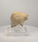 Rotating video of an ancient Mediterranean zoomorphic vessel fragment, attributed as a ram-head rhyton spout, circa 7th–4th century BCE, featuring a projecting muzzle, open mouth, hollow underside, weathered buff-coloured surface, and mineral-like deposits.