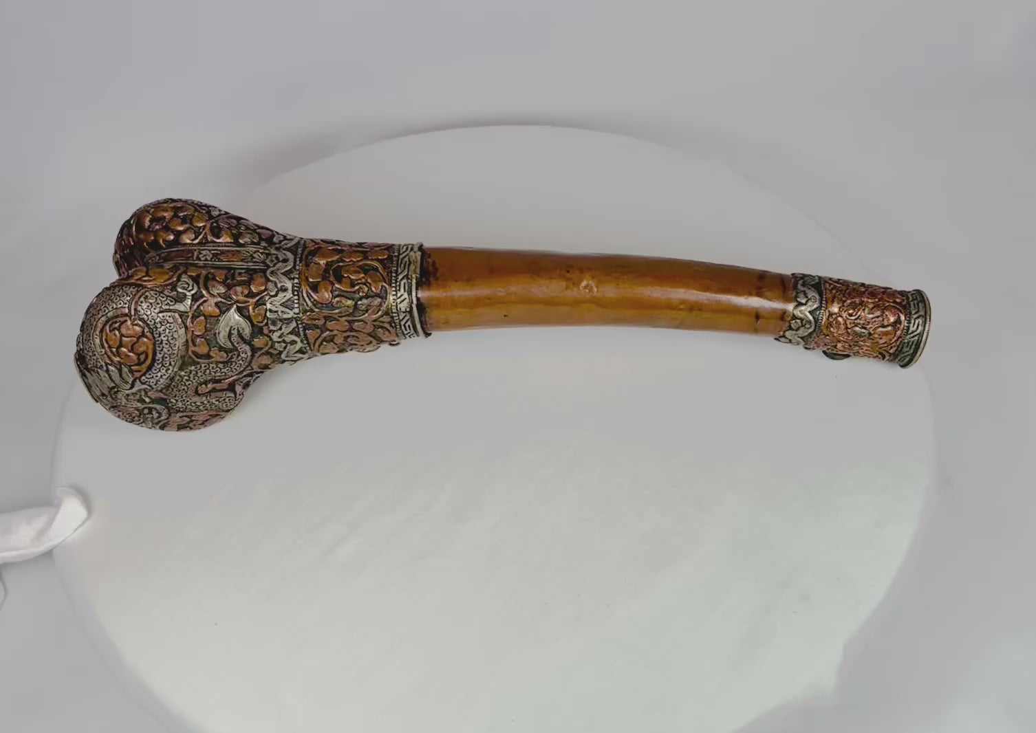 Rare Tibetan Kangling made from human tibia with silver fittings and turquoise inlay, used in chöd and funerary ceremonies, 19th–early 20th century, 13.5 inches long, with engraved dragon and foliate motifs, ceremonial ritual trumpet for Tibetan Buddhist practice