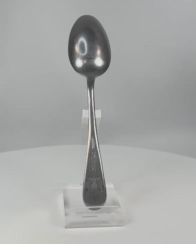 Close-up video of WWII German Kriegsmarine spoon showing front, back, and detailed zoom of markings including F.W.W. 41 and Rostfrei stamp