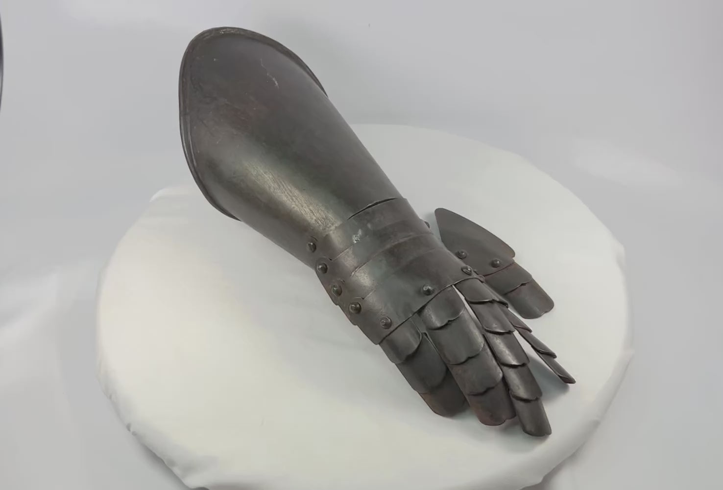 Antique 19th-century European steel gauntlet, right hand, flared cuff, articulated finger plates, hinged thumb defense, in 16th–17th-century style, 15 inches long