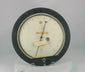 Close-up video of an authentic NASA low-pressure gauge from the 1980s Space Shuttle Program, manufactured by Heise in Newtown, Connecticut, marked ‘Property of NASA U.S. Government,’ with original calibration stickers and indicators used in pre-launch diagnostics.