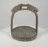 Rotating 360-degree video of an 18th–19th century Mongolian or Tibetan bronze stirrup, showing its dragon-head terminals, pierced latticework, coral and turquoise inlays, wide tread, saddle loop, and aged patina.