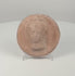 360-degree rotating view of a Hellenistic Greek terracotta female bust medallion, showing the high-relief portrait, elaborate coiffure, circular rim, weathered surface, and plain reverse.