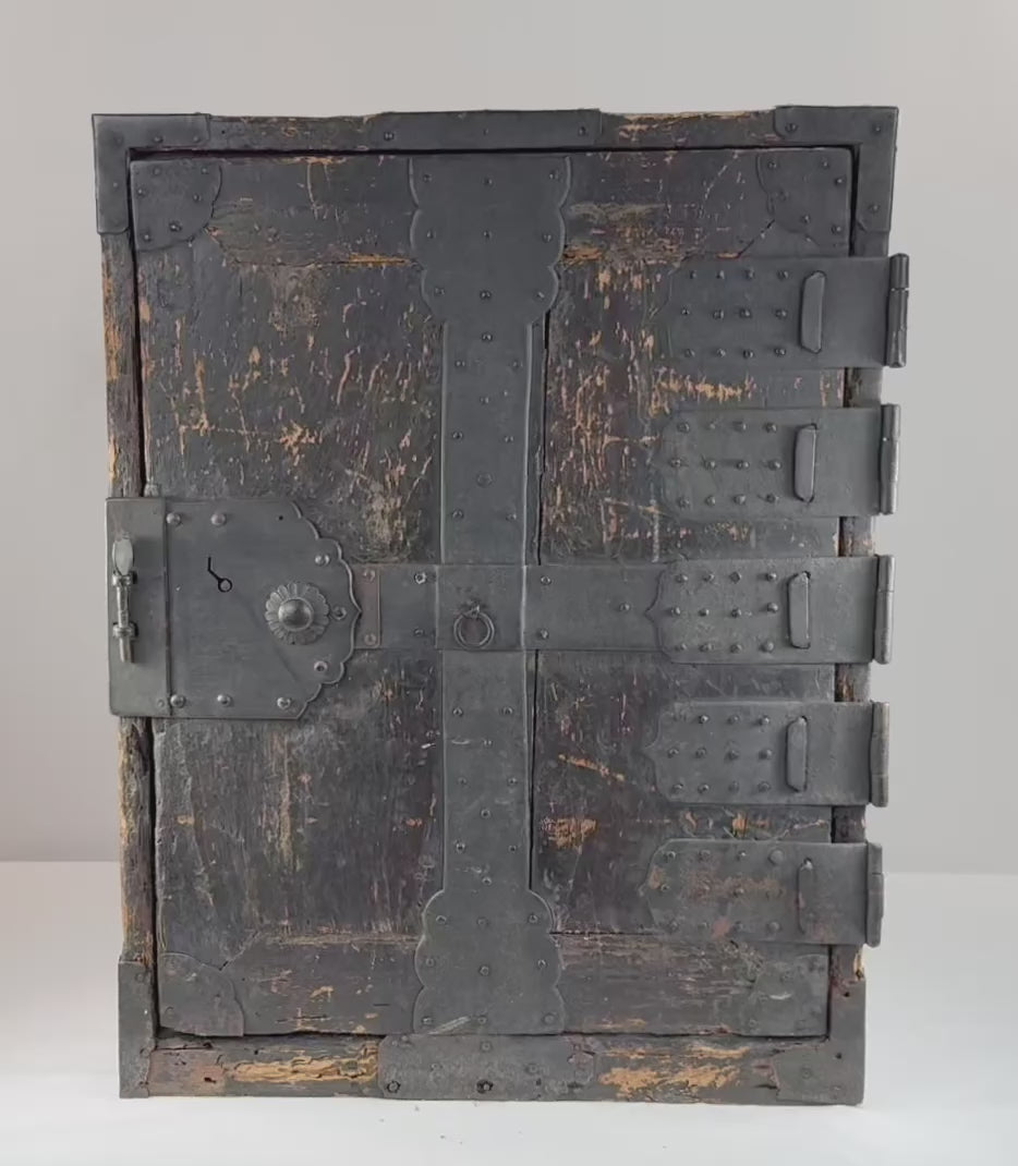 Antique Japanese Edo period funa tansu ship chest being opened step by step, with the reinforced front door opened and each interior drawer pulled out individually to reveal the later silver-storage fittings.