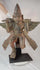 360° video of an antique hand-carved wooden winged temple guardian figure on a black museum stand, circa 18th–19th century.