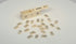 Rotating video of an antique miniature bone domino set and decorated sliding-lid case, circa 1800–1850